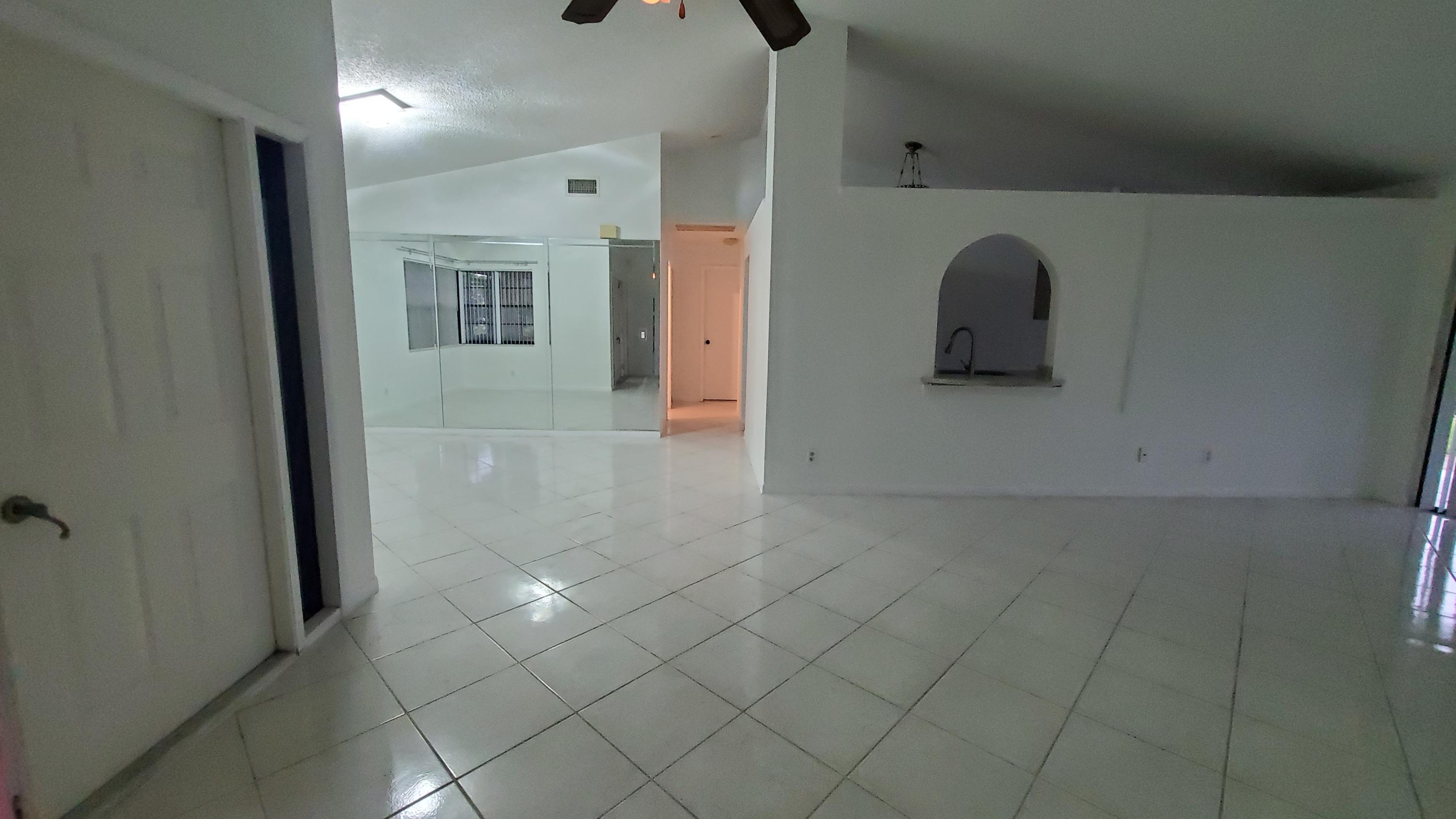 9876 Majorca Place Boca Raton, FL 33434 - Photo 4 of 33 living/dining