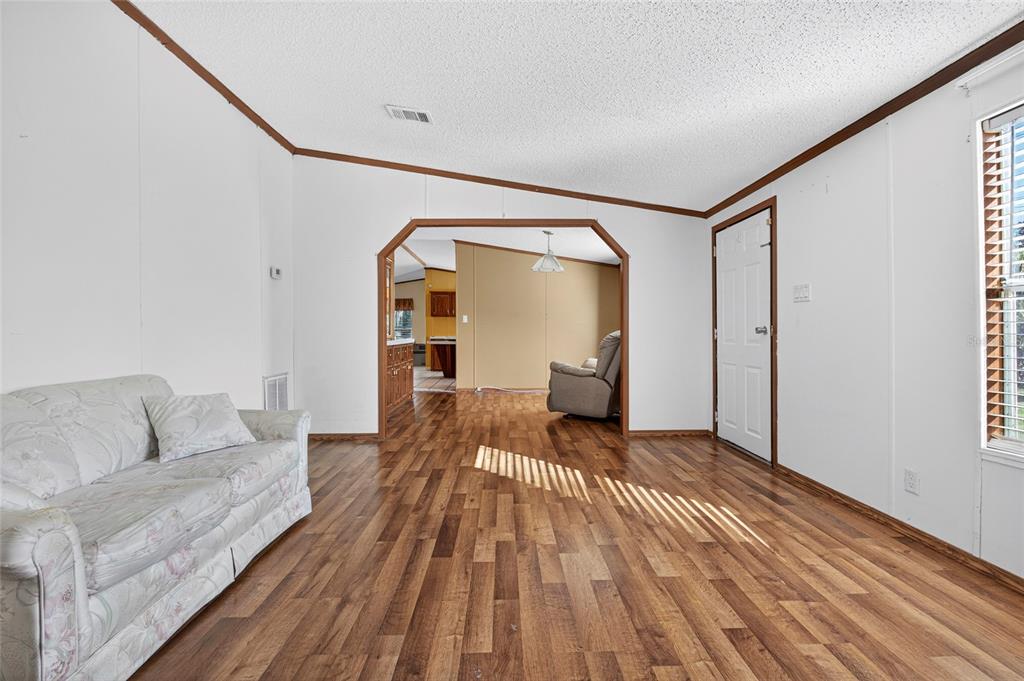 4661 Shepherd Road Lakeland, FL 33811 - Photo 33 of 33 a view of livingroom with furniture and wooden floor