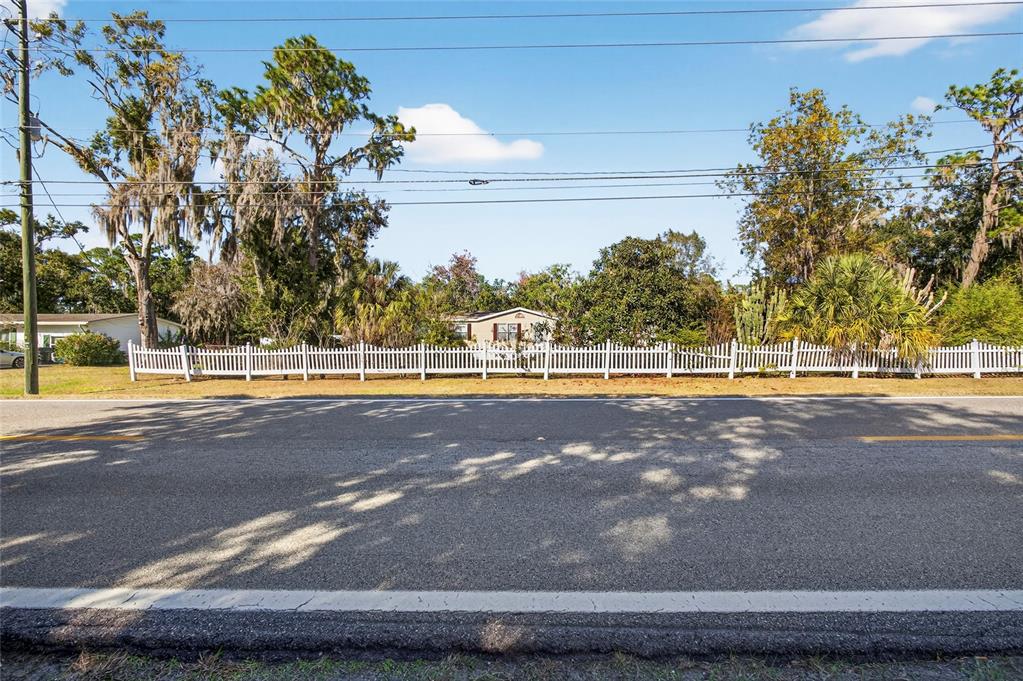 4661 Shepherd Road Lakeland, FL 33811 - Photo 6 of 33 a view of a swimming pool with an outdoor space and seating area
