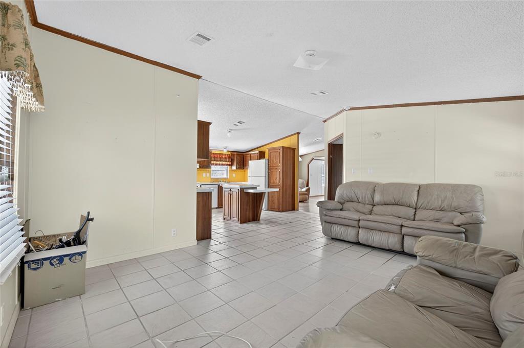 4661 Shepherd Road Lakeland, FL 33811 - Photo 10 of 33 a living room with furniture and a couch