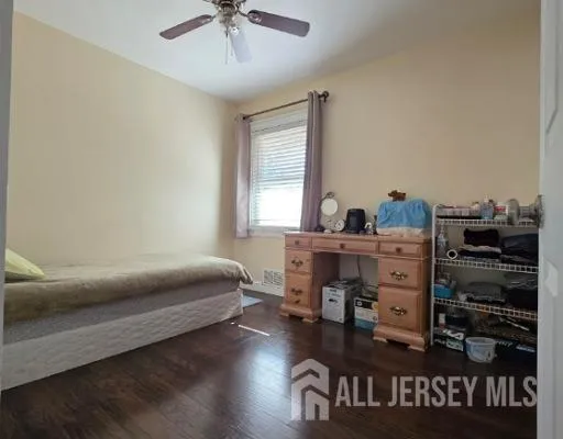 a bedroom with a bed and furniture