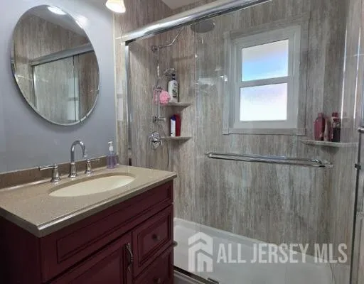 a bathroom with a sink and a mirror