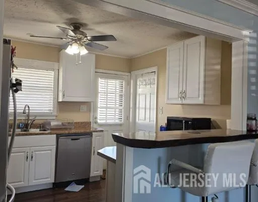 a kitchen with a cabinets counter top space and a window