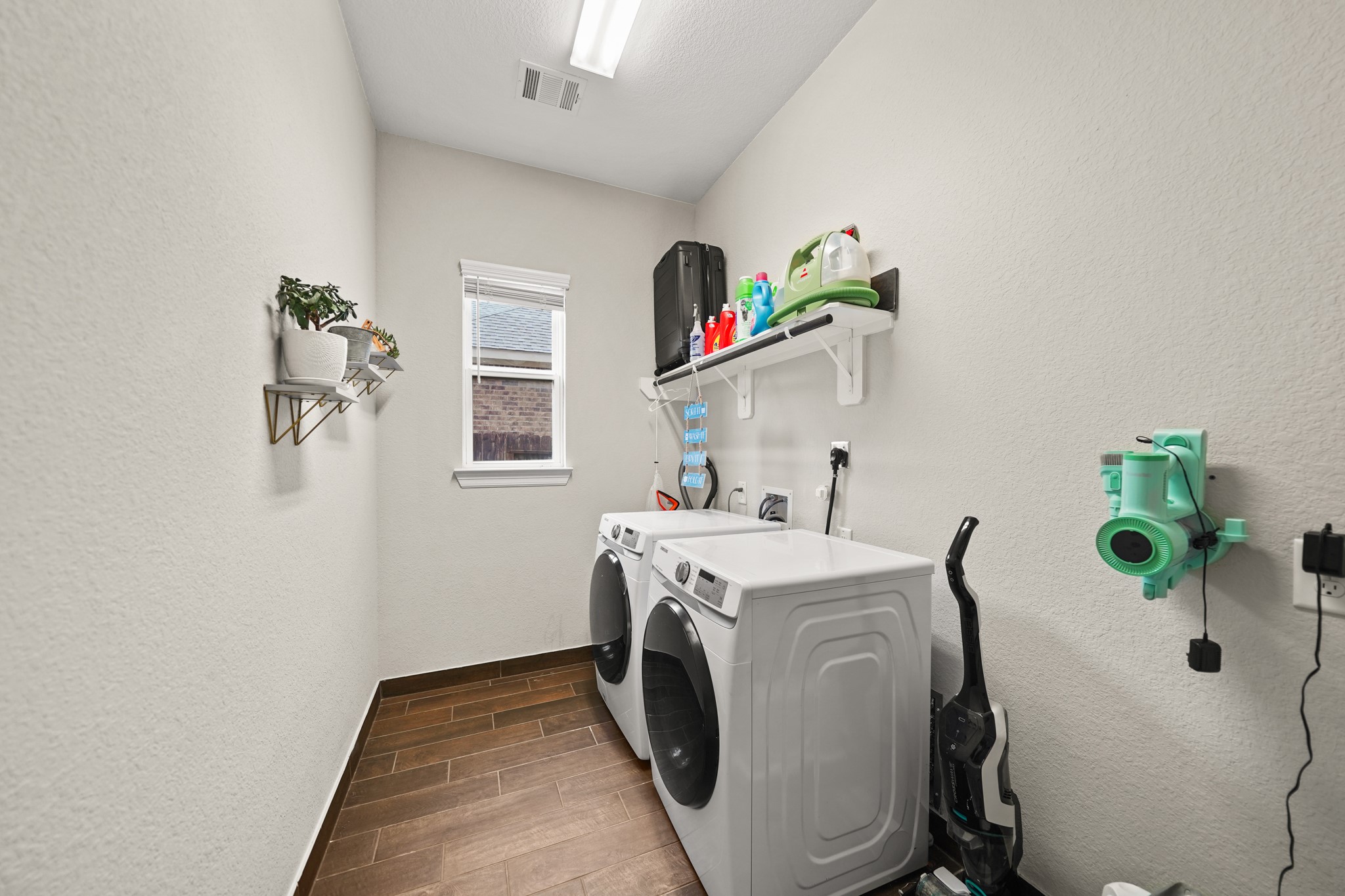 24031 Corinaldo Court Katy, TX 77493 - Photo 19 of 23 a utility room with dryer and washer