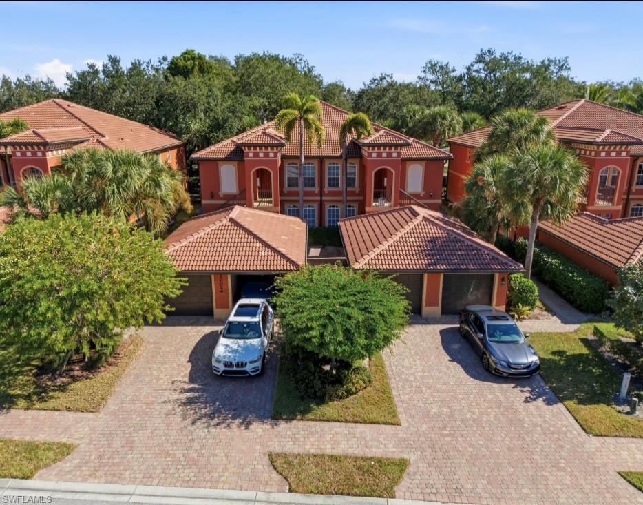 10024 Heather Lane, Unit 1001 Naples, FL 34119 - Photo 4 of 23 an aerial view of a house