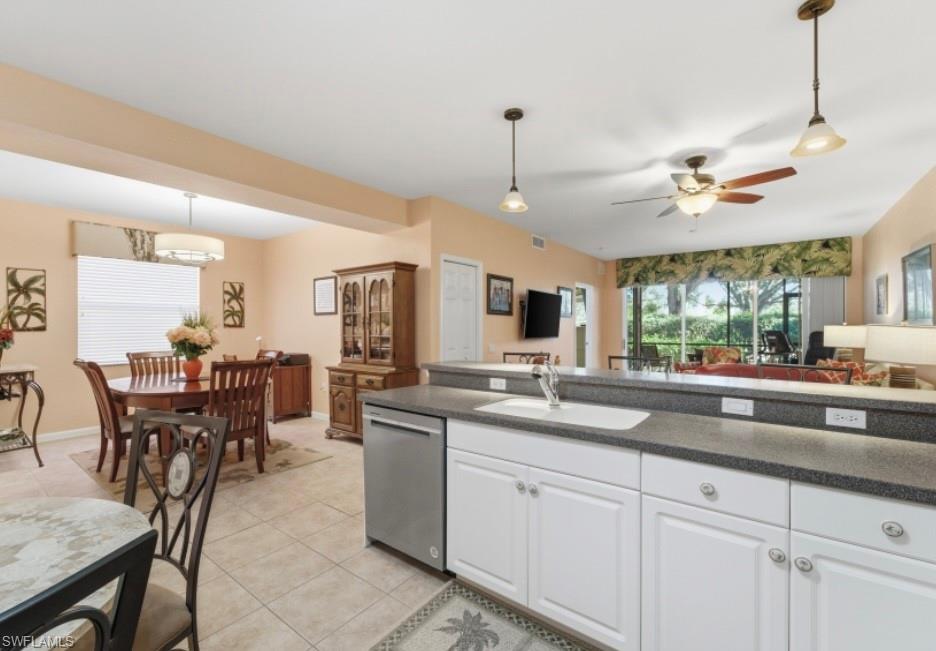 10024 Heather Lane, Unit 1001 Naples, FL 34119 - Photo 23 of 23 a kitchen with counter space cabinets and appliances