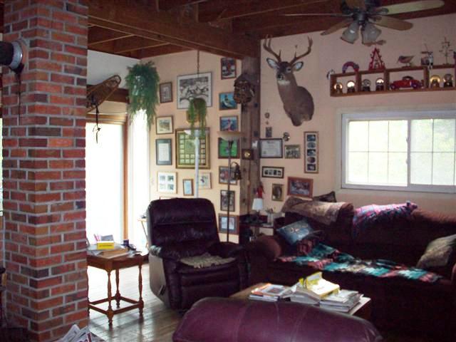 230 East Windsor Road Peru, MA 01235 - Photo 7 of 9 a living room with furniture and a window