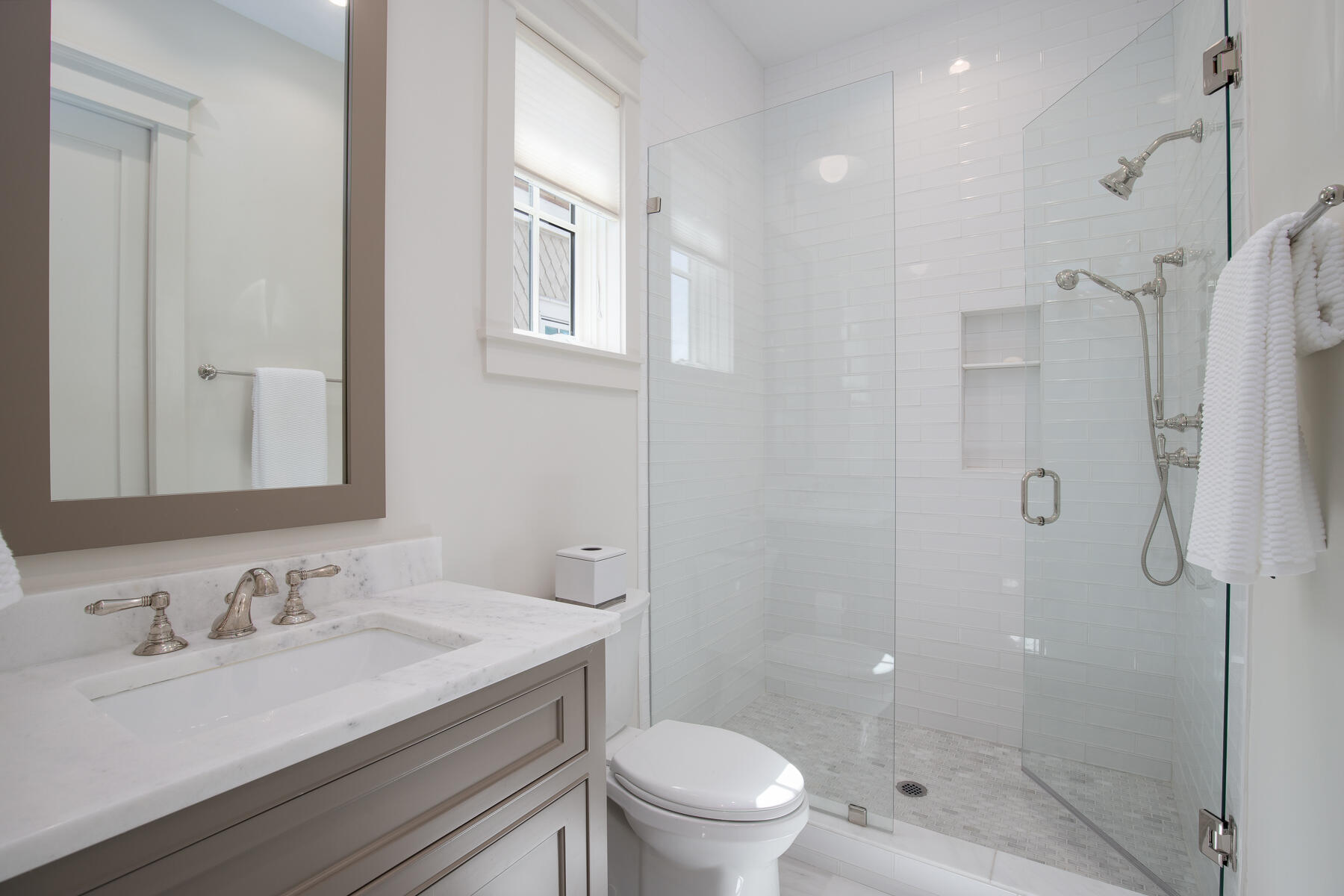 10 Rainer Lane Watersound, FL 32461 - Photo 24 of 30 a bathroom with a granite countertop sink a toilet and shower