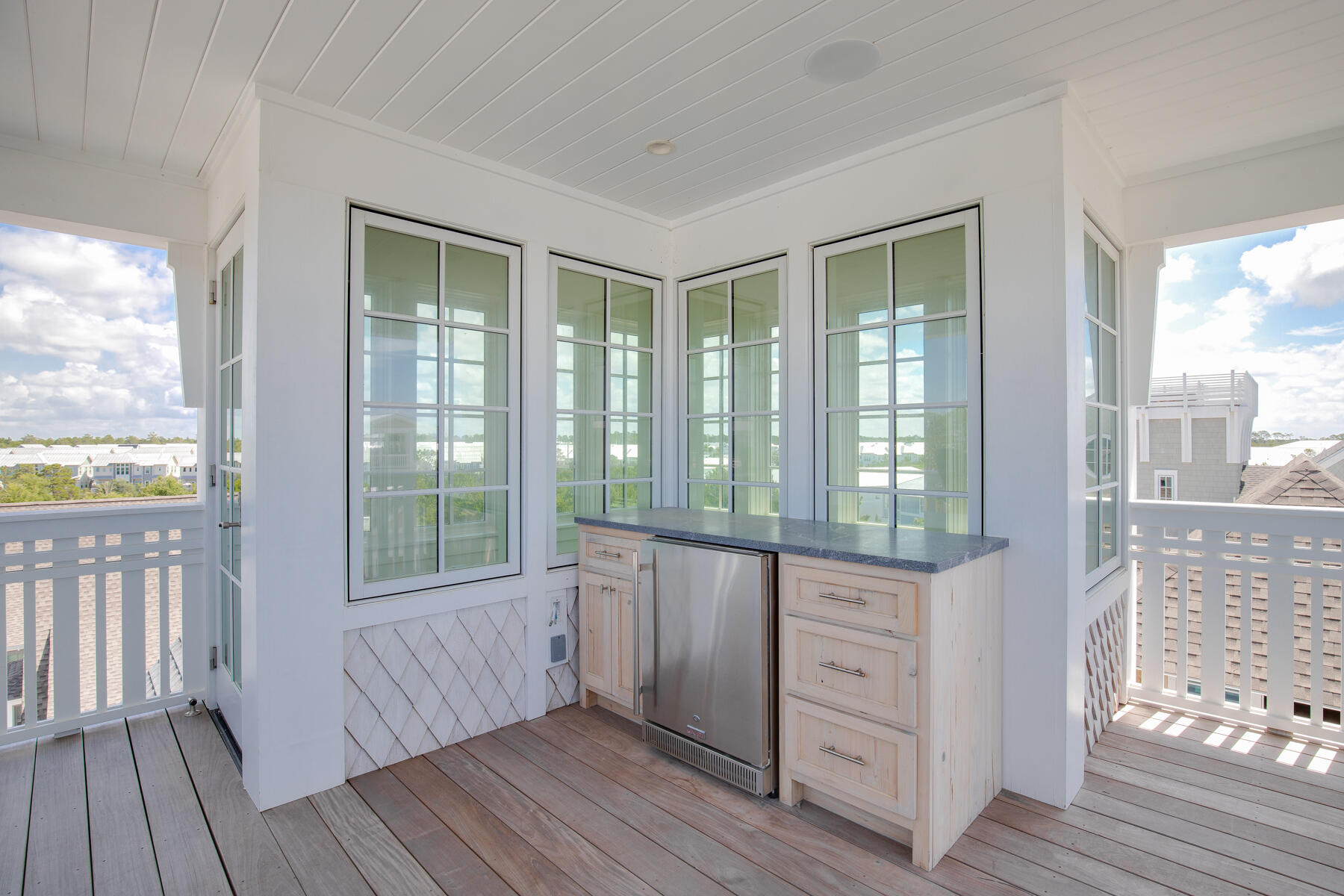 10 Rainer Lane Watersound, FL 32461 - Photo 28 of 30 a view of a hardwood floor and windows in a room