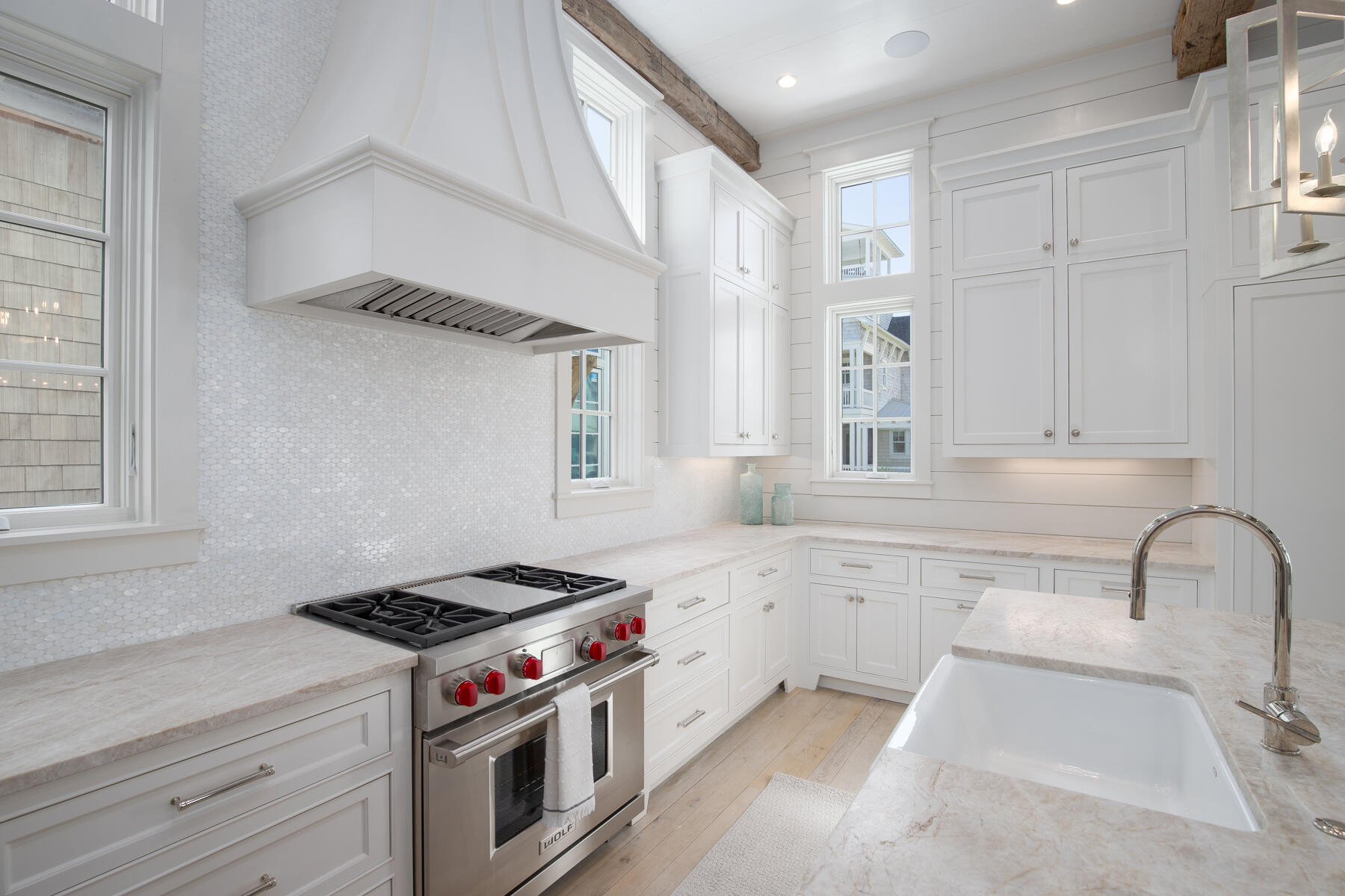 10 Rainer Lane Watersound, FL 32461 - Photo 9 of 30 a kitchen with stainless steel appliances granite countertop a stove a sink and a refrigerator