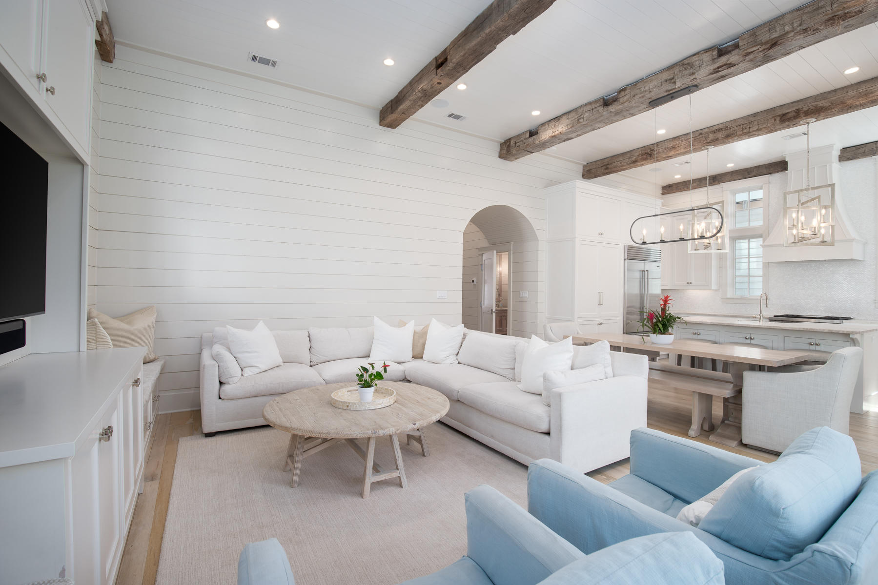 10 Rainer Lane Watersound, FL 32461 - Photo 10 of 30 a living room with furniture white walls and a flat screen tv