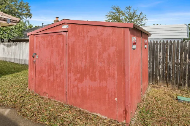 a view of a wooden fence
