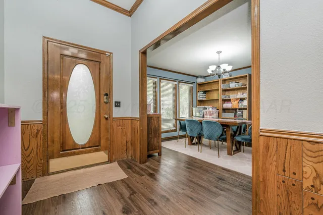 a view of a livingroom with furniture and wooden floor