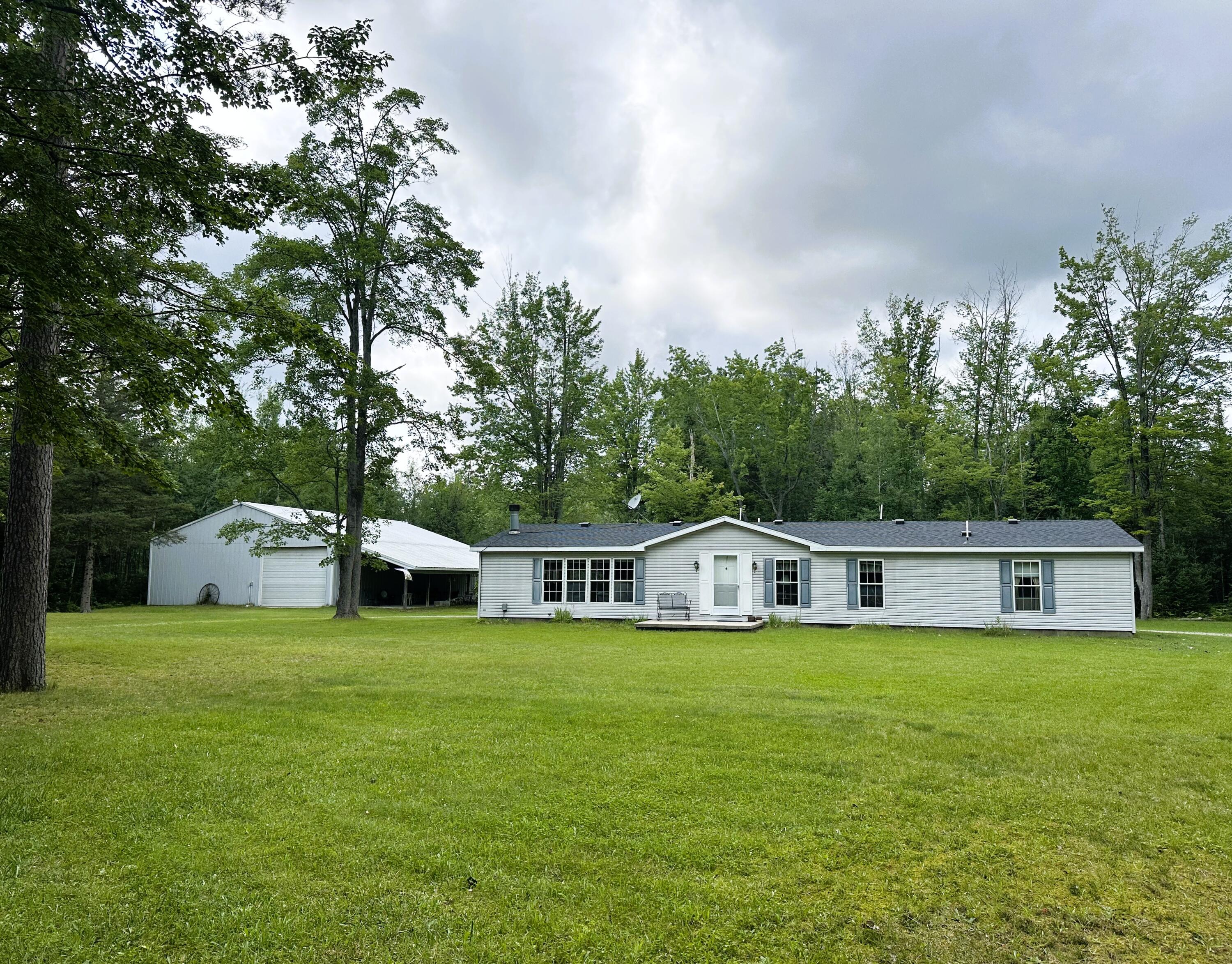 18860 Lockwood Lake Road Atlanta, MI 49709 - Photo 1 of 47