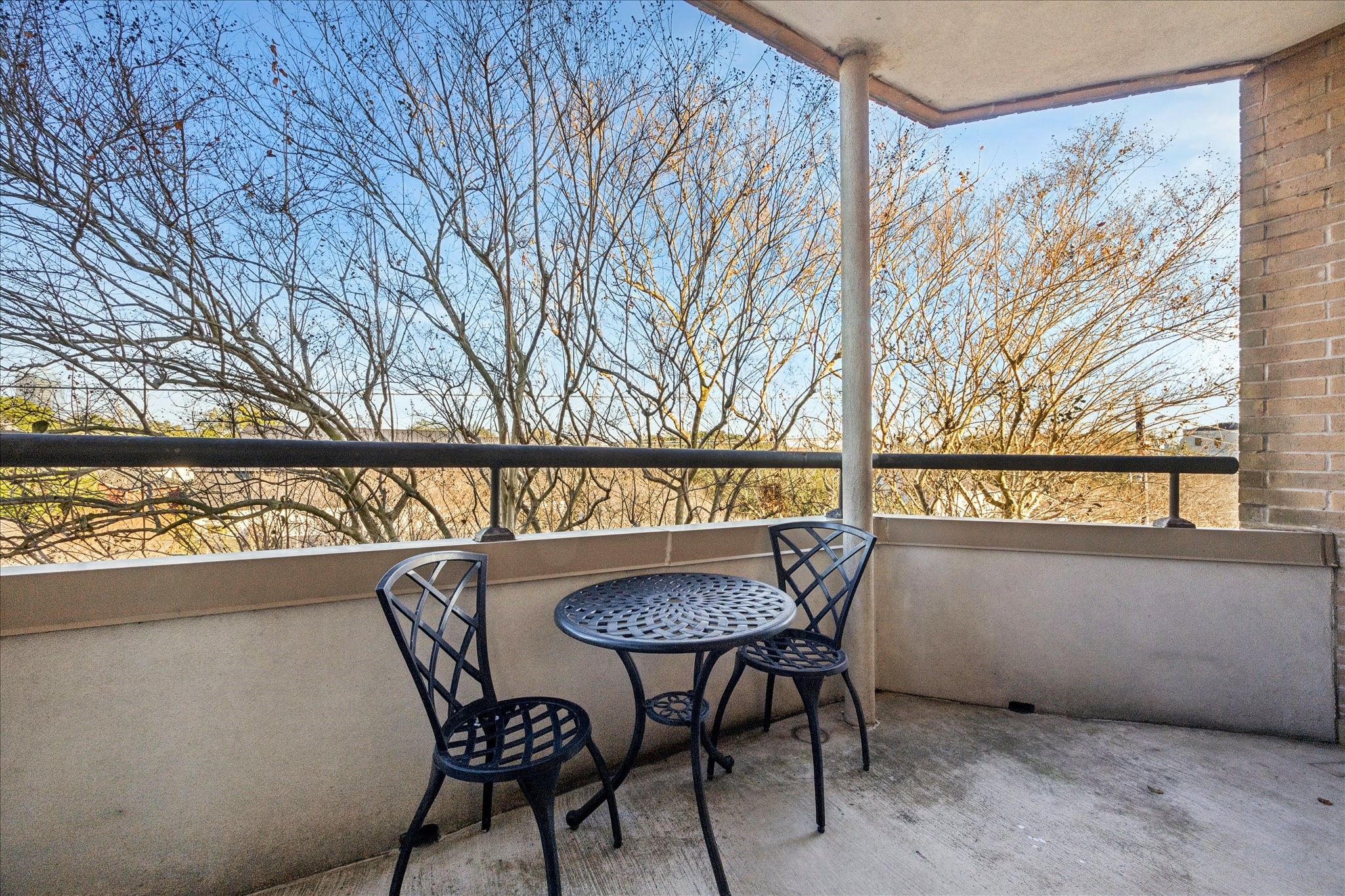5200 Weslayan Street, Unit 302 Houston, TX 77005 - Photo 12 of 15 a view of a chairs and table in a balcony