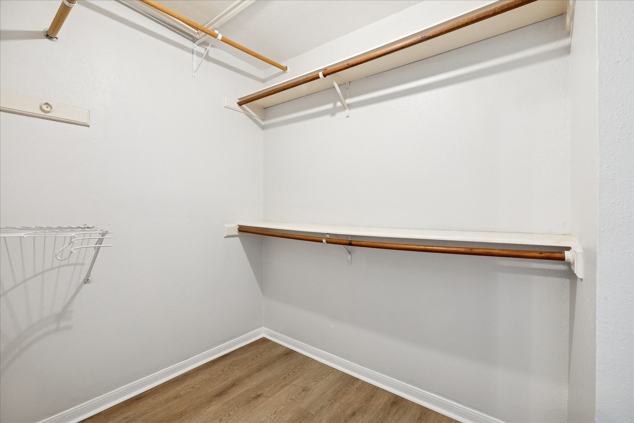 5200 Weslayan Street, Unit 302 Houston, TX 77005 - Photo 13 of 15 a view of a room with wooden floor
