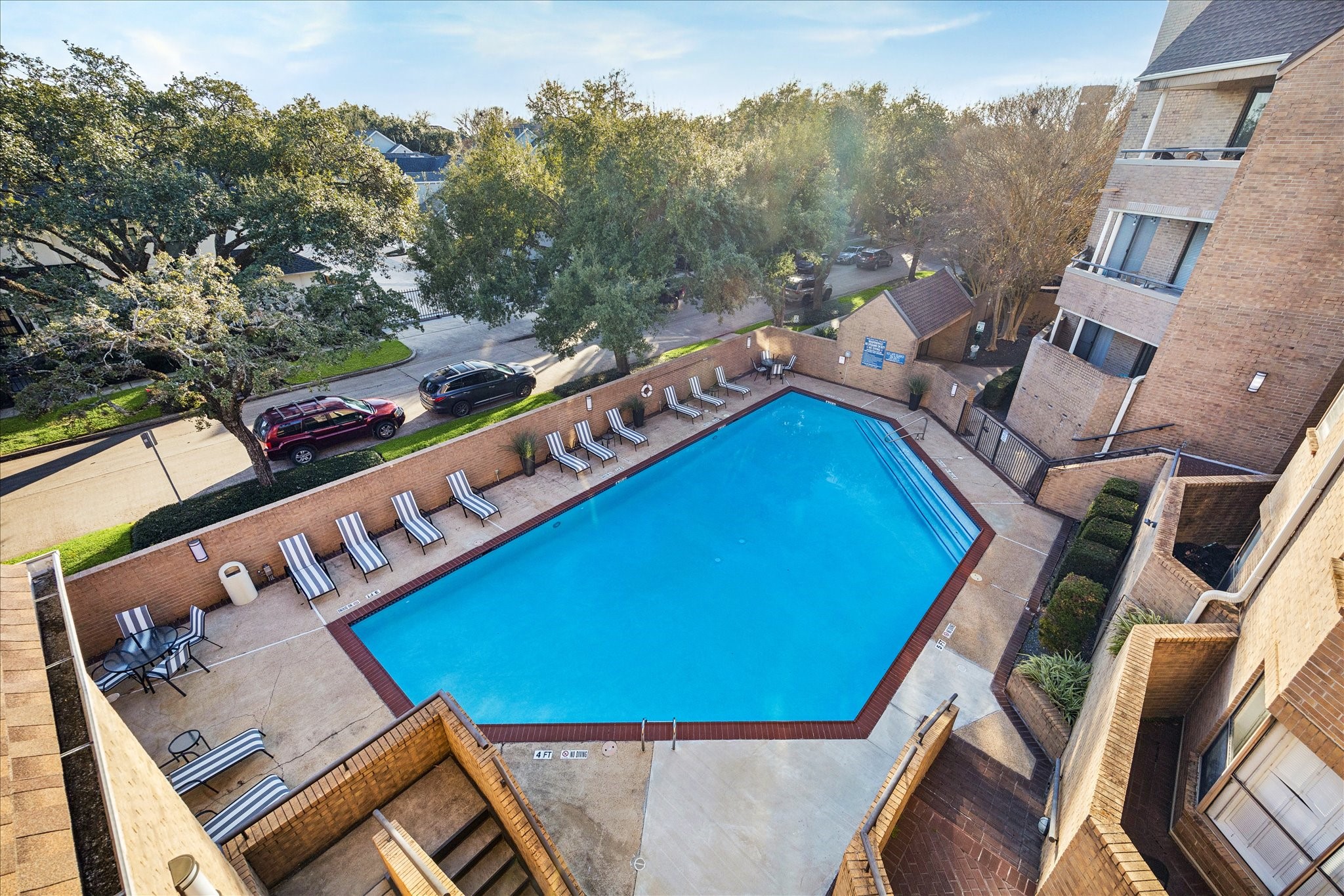 5200 Weslayan Street, Unit 302 Houston, TX 77005 - Photo 6 of 15 a view of a balcony with chairs