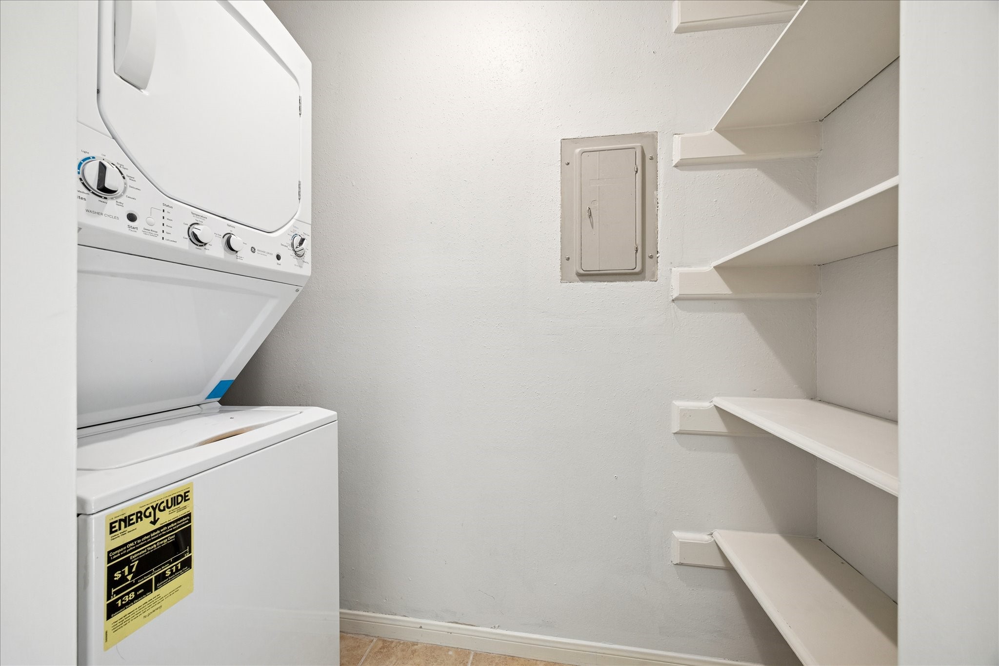 5200 Weslayan Street, Unit 302 Houston, TX 77005 - Photo 9 of 15 a utility room with dryer and washer