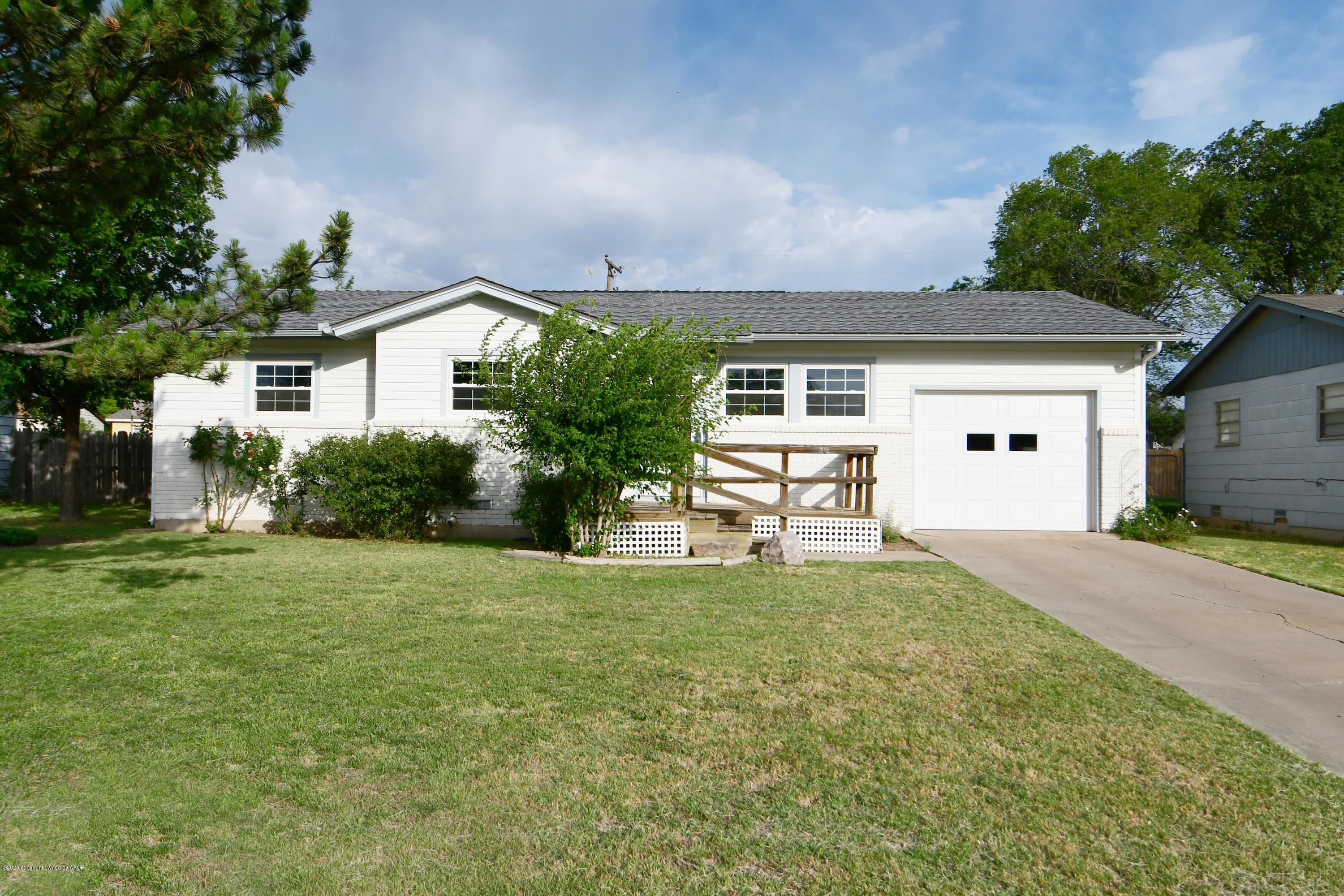 5204 South Travis Street Amarillo, TX 79110 - Photo 2 of 25 a house view with a garden space