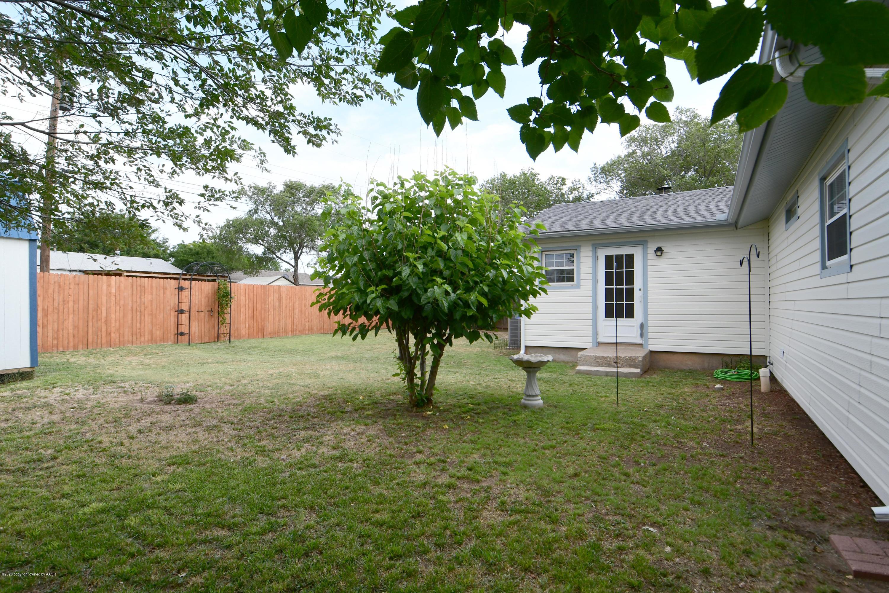 5204 South Travis Street Amarillo, TX 79110 - Photo 24 of 25 a house view with a garden space