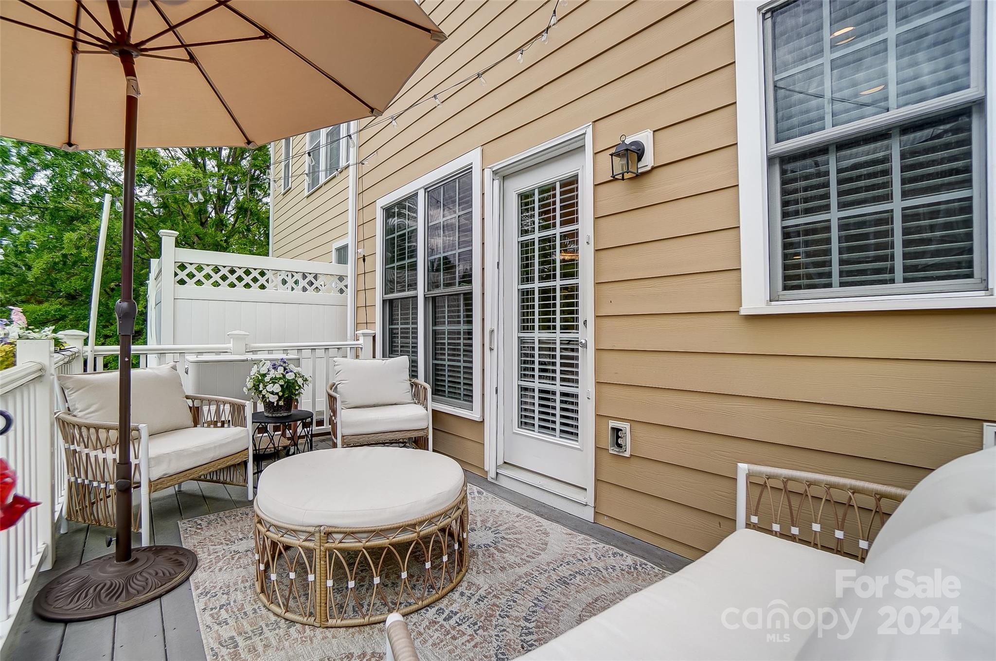 825 Granby Drive Fort Mill, SC 29708 - Photo 20 of 38 a view of a porch with furniture and a yard