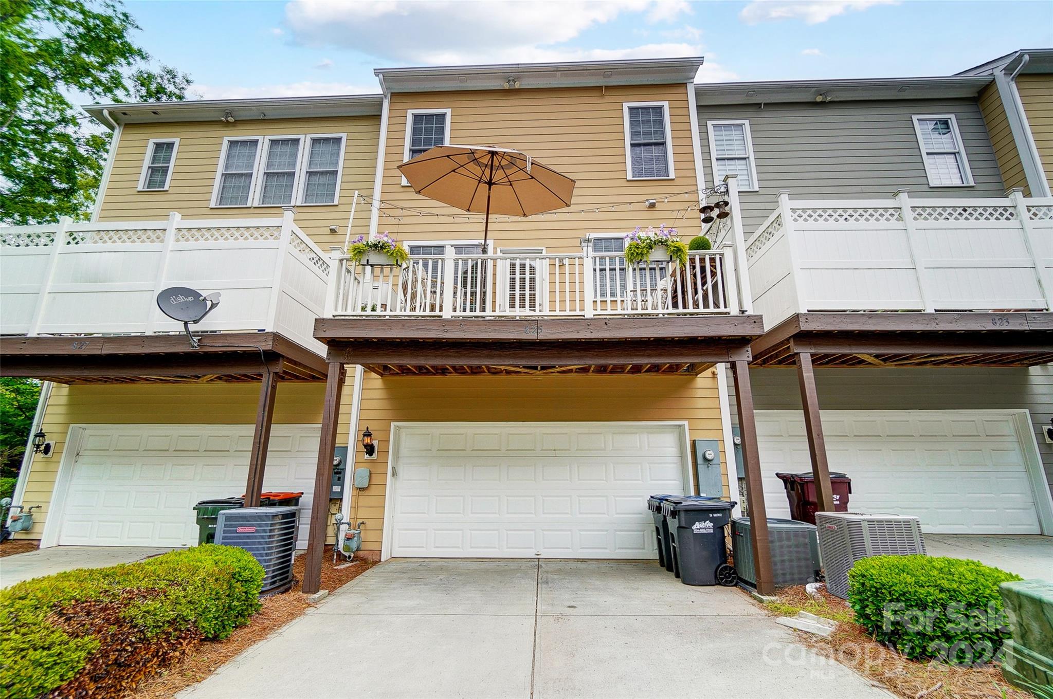 825 Granby Drive Fort Mill, SC 29708 - Photo 33 of 38 a front view of a house with barbeque and garage