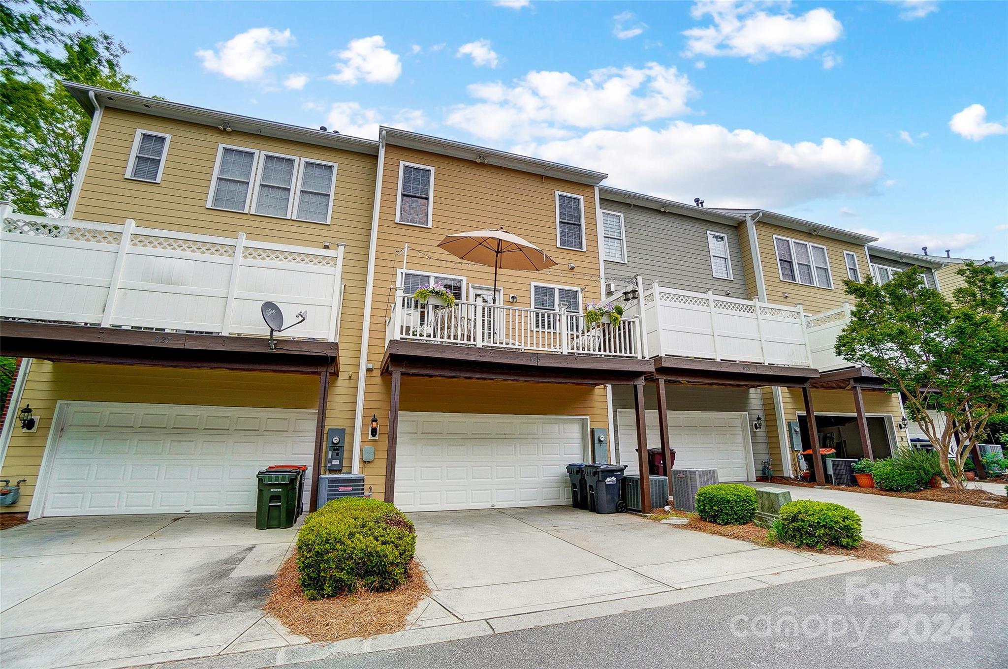 825 Granby Drive Fort Mill, SC 29708 - Photo 34 of 38 a front view of a house with a garage