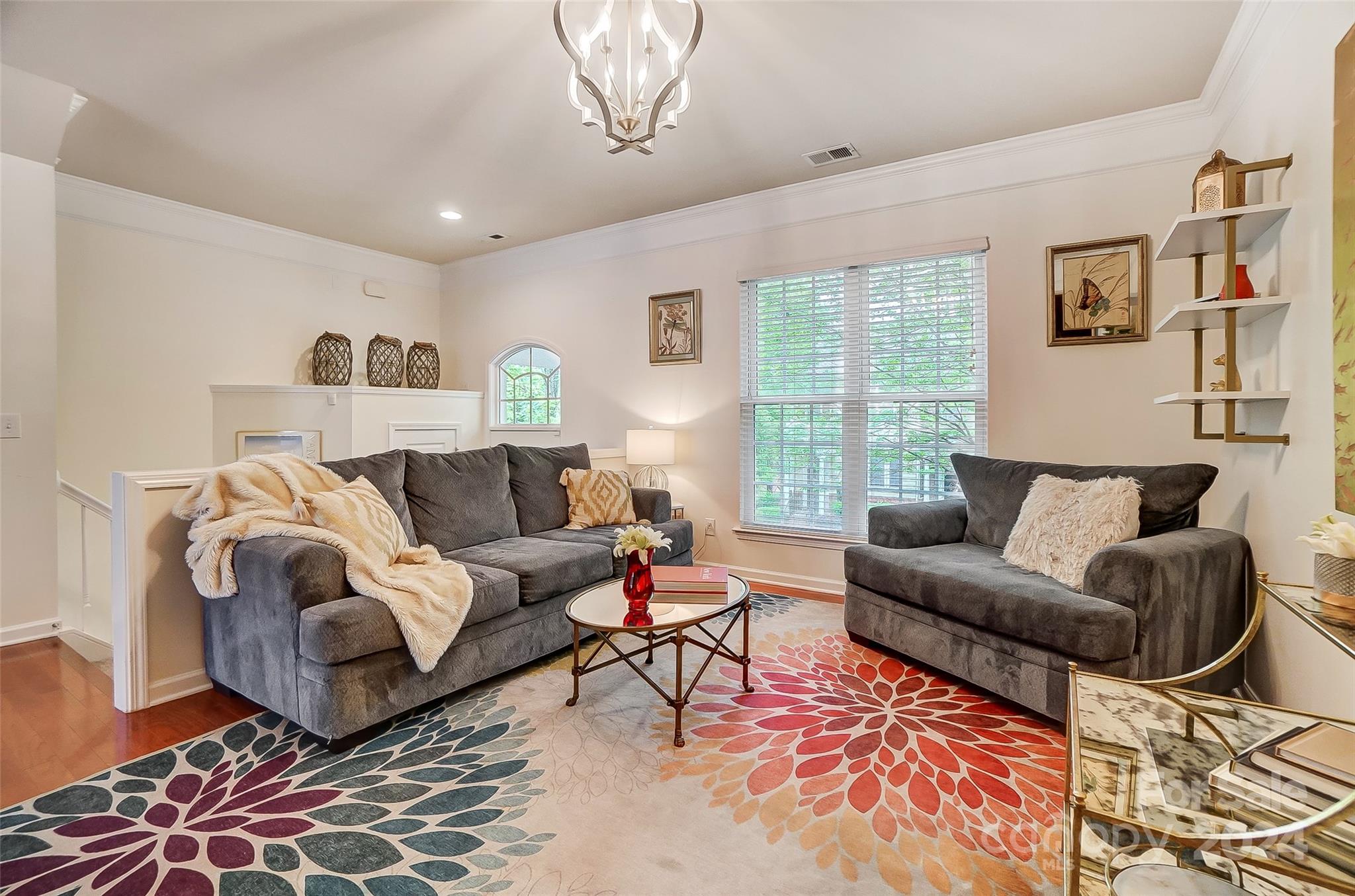 825 Granby Drive Fort Mill, SC 29708 - Photo 6 of 38 a living room with furniture and a large window