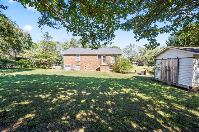 a view of a back yard of the house
