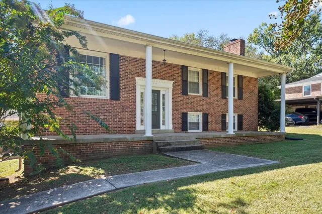 a view of a door with a porch