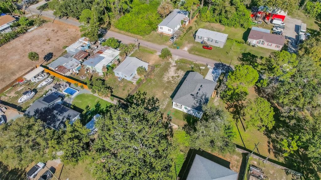 3242 Roxborough Avenue Clearwater, FL 33762 - Photo 20 of 20 an aerial view of residential house with outdoor space and trees all around