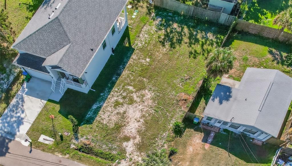 3242 Roxborough Avenue Clearwater, FL 33762 - Photo 9 of 20 an aerial view of a house with a yard