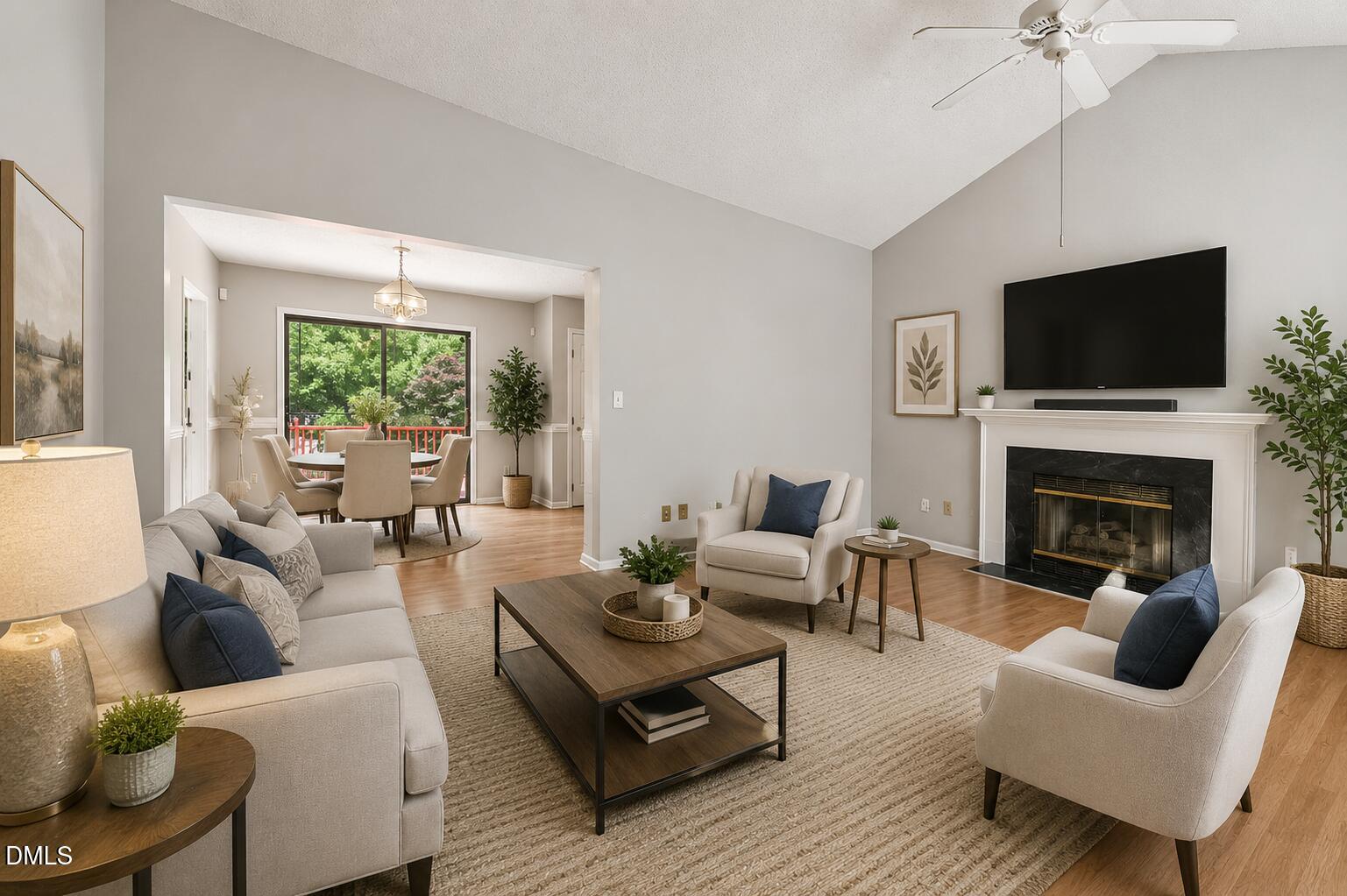 2800 West Jameson Road Raleigh, NC 27604 - Photo 3 of 28 a living room with furniture fireplace and a flat screen tv