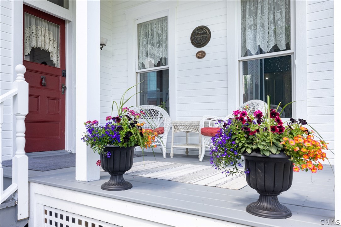 1 County Rte 10 Schroeppel, NY 13132 - Photo 22 of 49 Side Porch overlooking Gardens