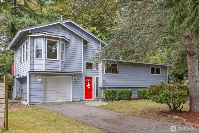a front view of a house with a garage