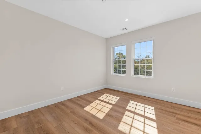 a view of an empty room and window