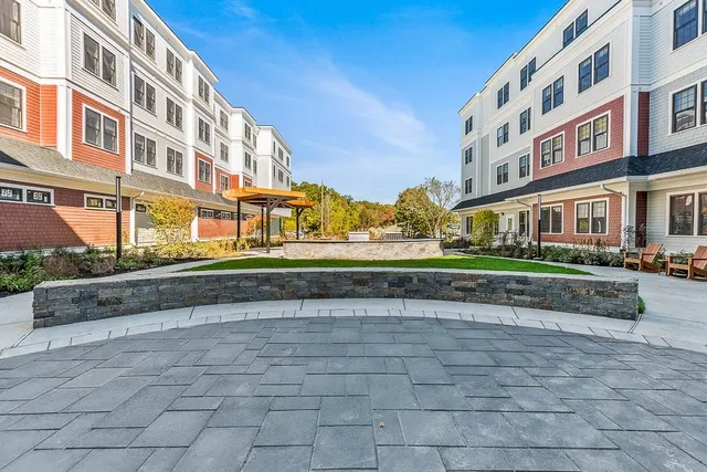 a view of an apartment with a garden and plants