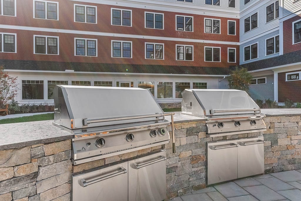 22 Everett Street, Unit 424 Westwood, MA 02090 - Photo 23 of 30 a view of building with barbeque oven