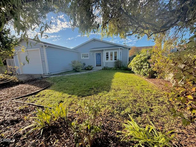 a view of a house with garden