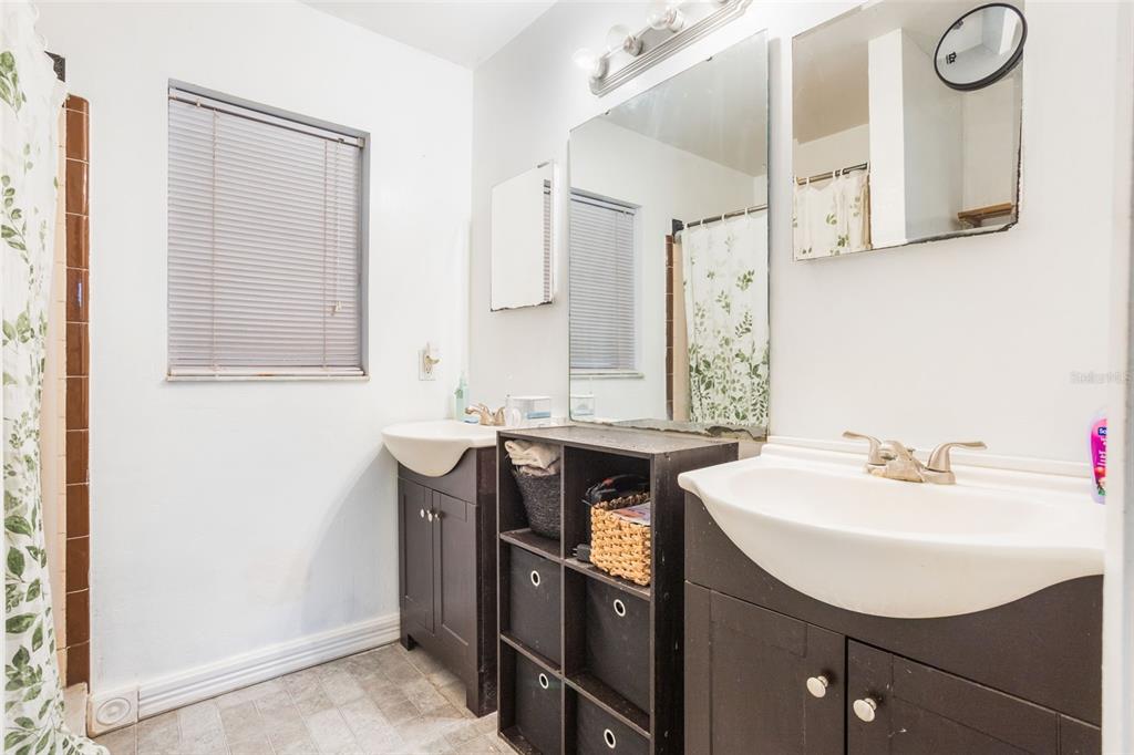 1029 Antelope Trail Winter Springs, FL 32708 - Photo 22 of 28 a bathroom with a sink vanity and a mirror