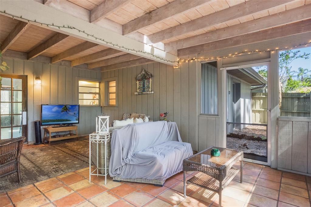 1029 Antelope Trail Winter Springs, FL 32708 - Photo 24 of 28 a living room with furniture a flat screen tv and a table