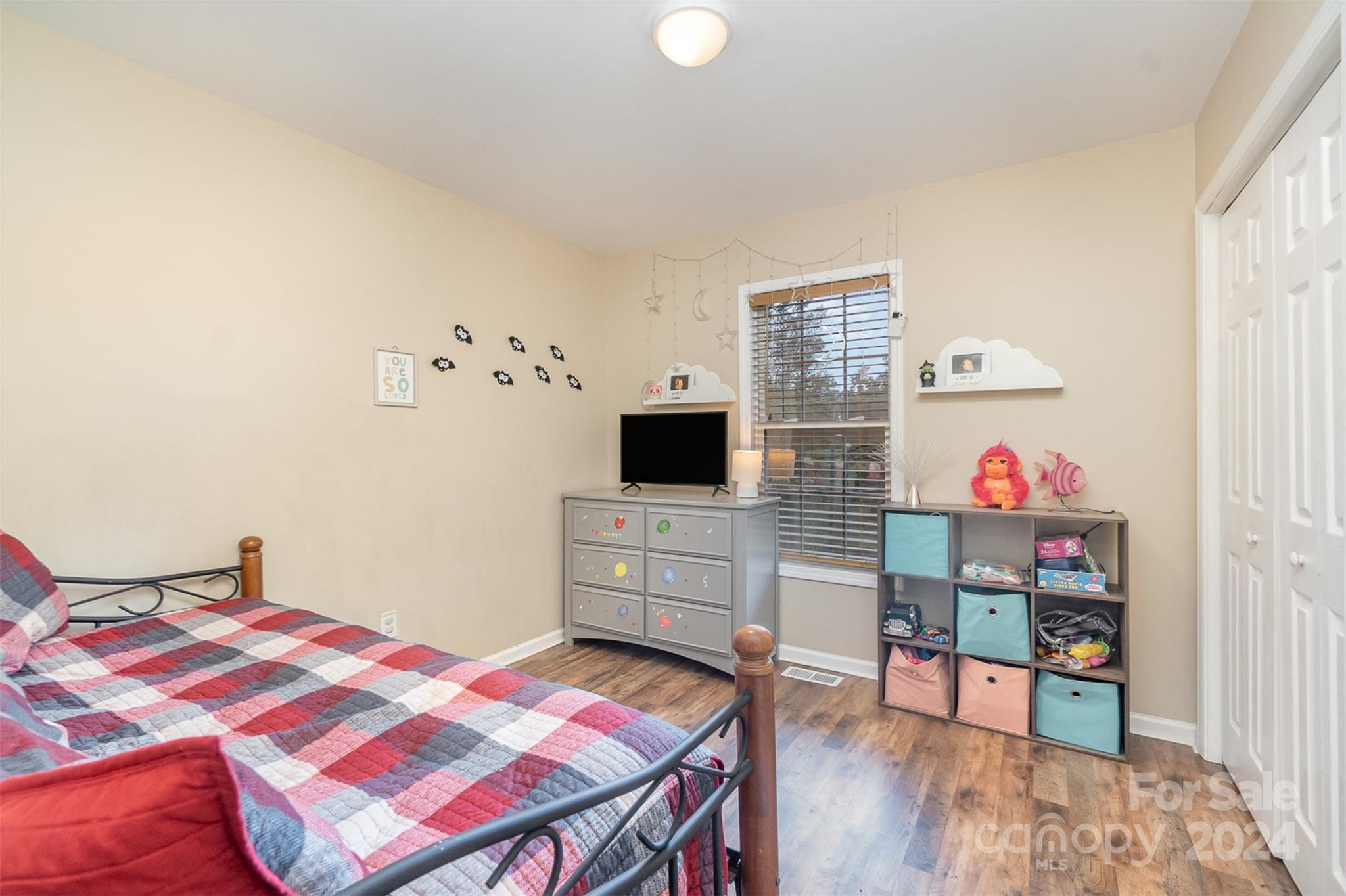 3526 Herman Sipe Road Conover, NC 28613 - Photo 18 of 29 a bedroom with a bed and wooden floor