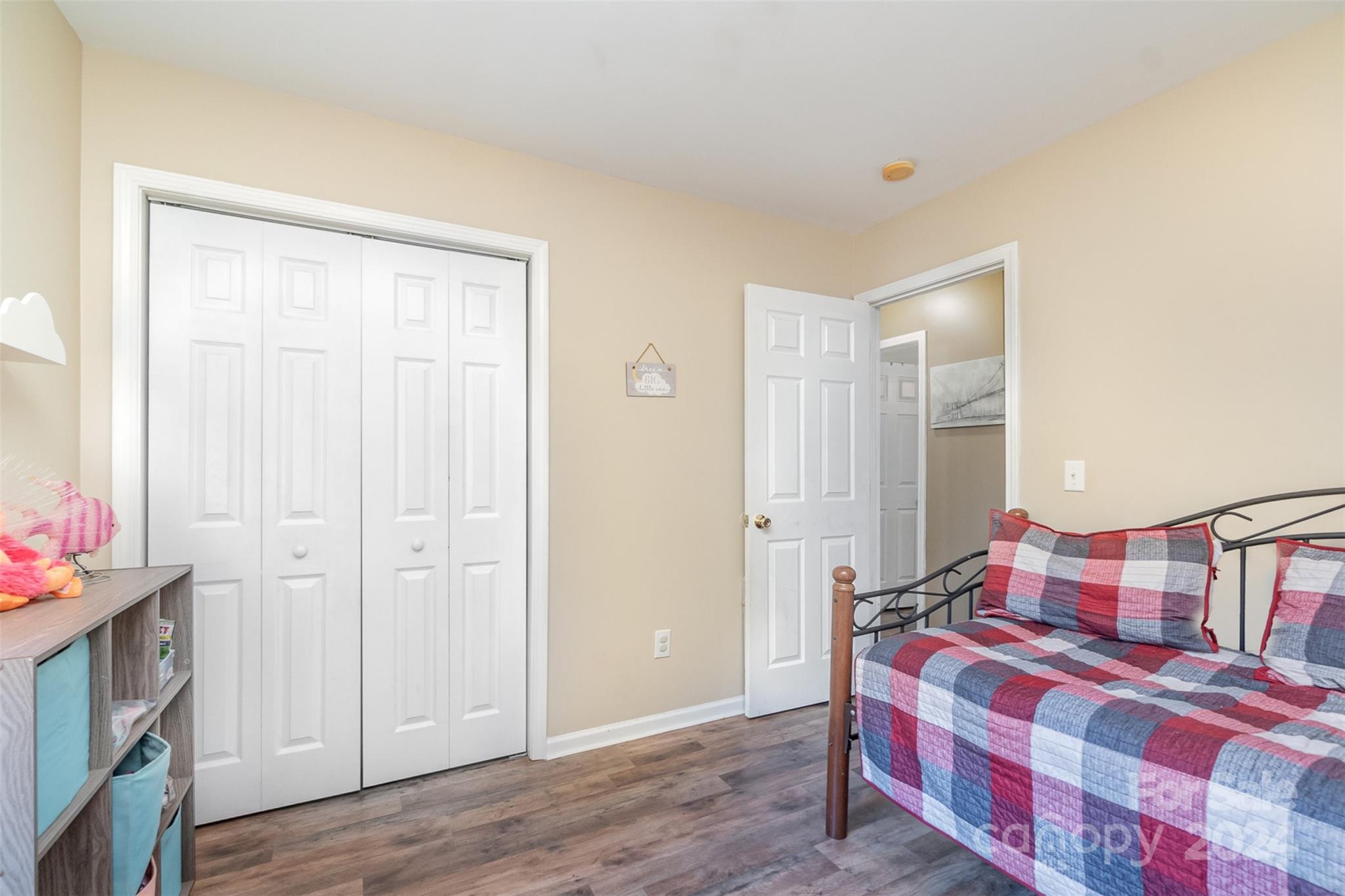 3526 Herman Sipe Road Conover, NC 28613 - Photo 19 of 29 a bedroom with a bed and wooden floor