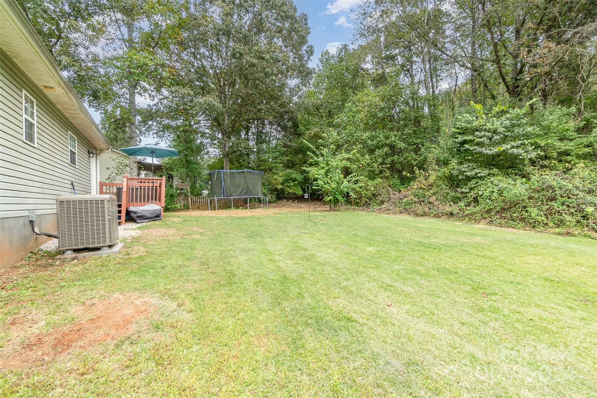 3526 Herman Sipe Road Conover, NC 28613 - Photo 25 of 29 a view of a house with a yard and a garage