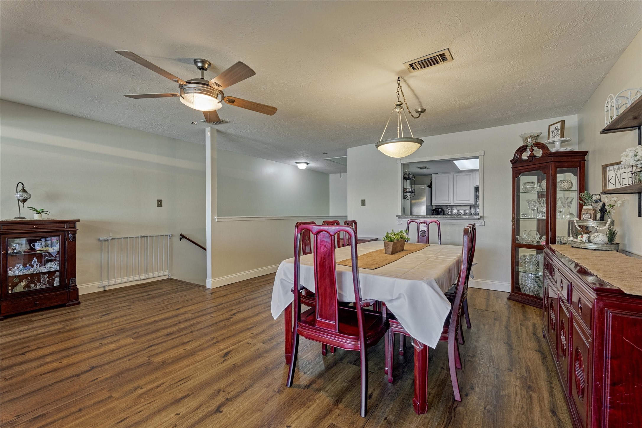 39 Regency Point Conroe, TX 77356 - Photo 20 of 44 a view of a dining room with furniture and wooden floor