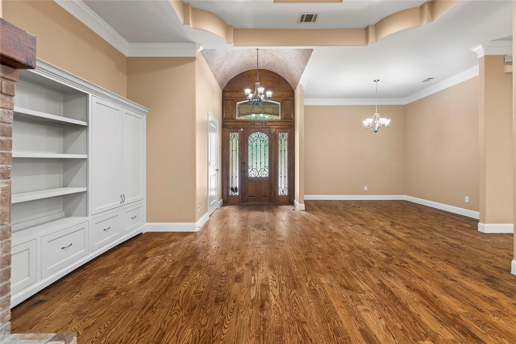 7806 Garner Road Rowlett, TX 75088 - Photo 4 of 34 wooden floor in an empty room with a window
