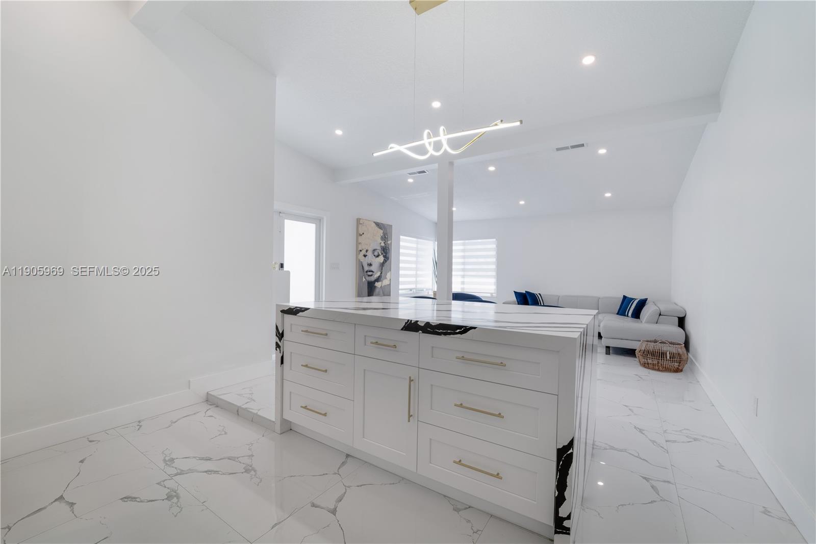 9746 Southwest 147th Court Miami, FL 33196 - Photo 12 of 42 a bathroom with a granite countertop sink a mirror and vanity
