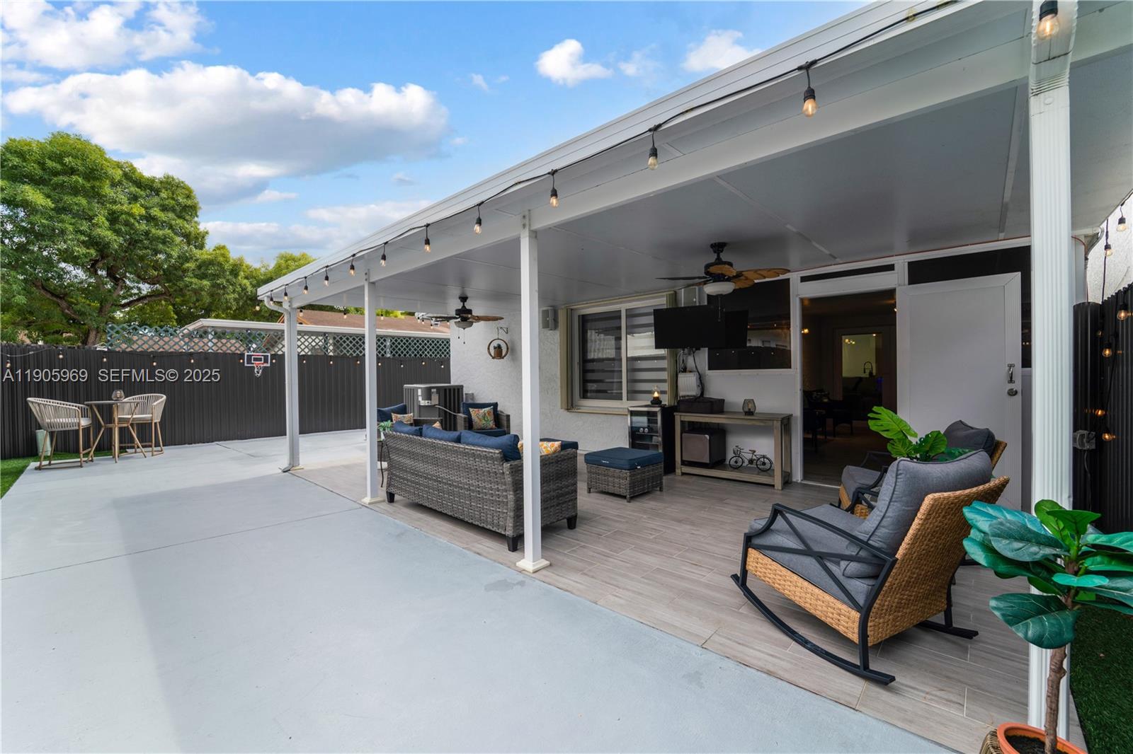 9746 Southwest 147th Court Miami, FL 33196 - Photo 32 of 42 a view of living room and balcony