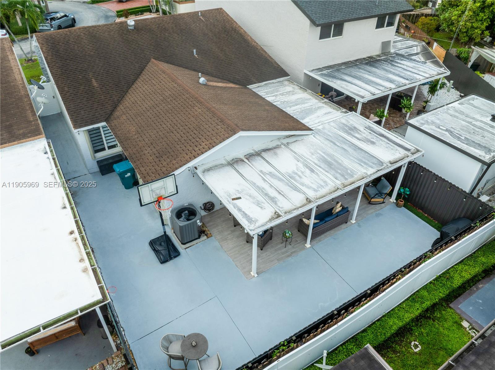 9746 Southwest 147th Court Miami, FL 33196 - Photo 35 of 42 an aerial view of a house with roof deck