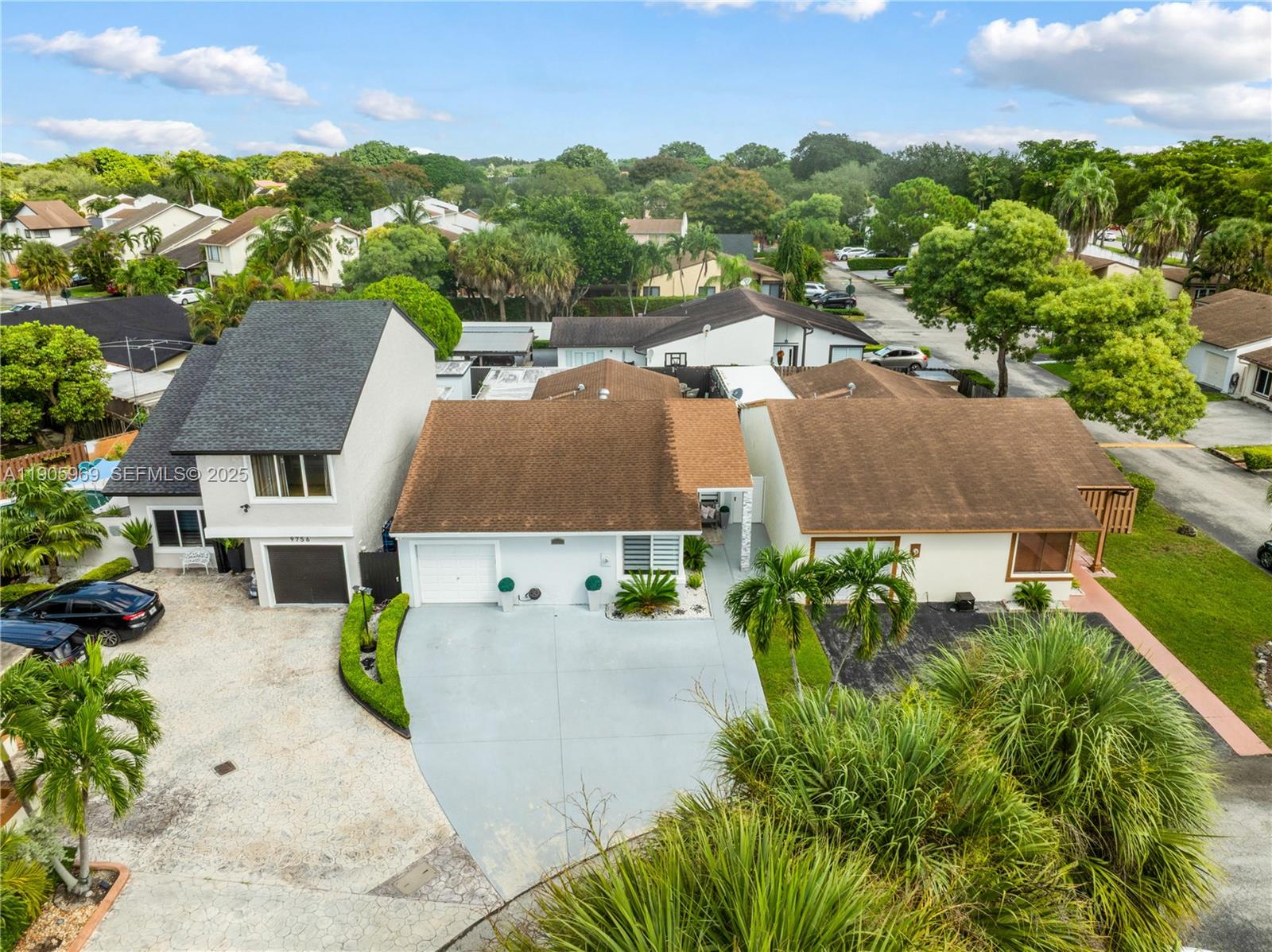 9746 Southwest 147th Court Miami, FL 33196 - Photo 37 of 42 an aerial view of a house with yard swimming pool and outdoor seating